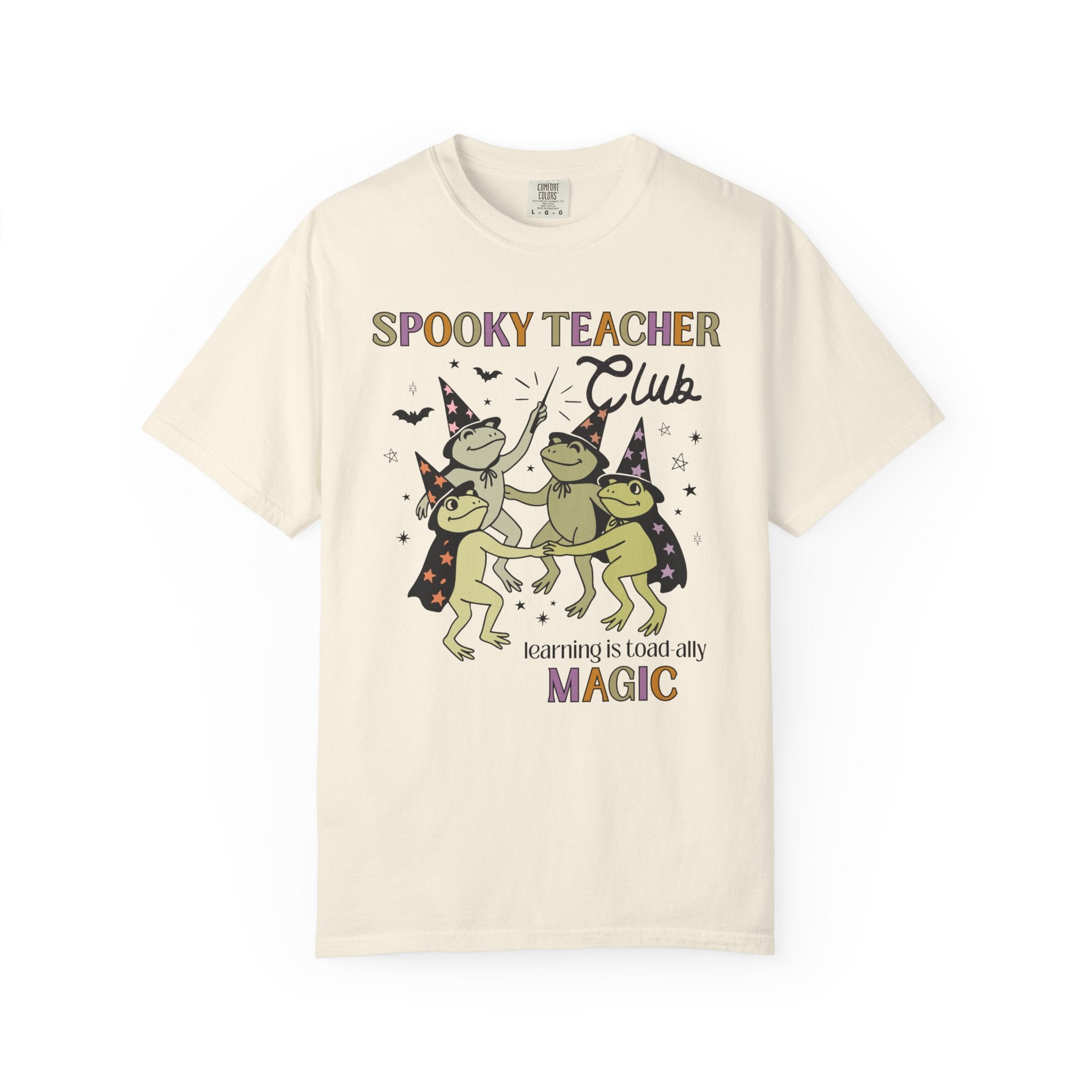 Halloween Teacher Tee Shirt with Cute Witchy Frogs: Learning is Magic! Funny Saying Spooky Season T-Shirt with Stars, Magical Animal Lover - Opal and June