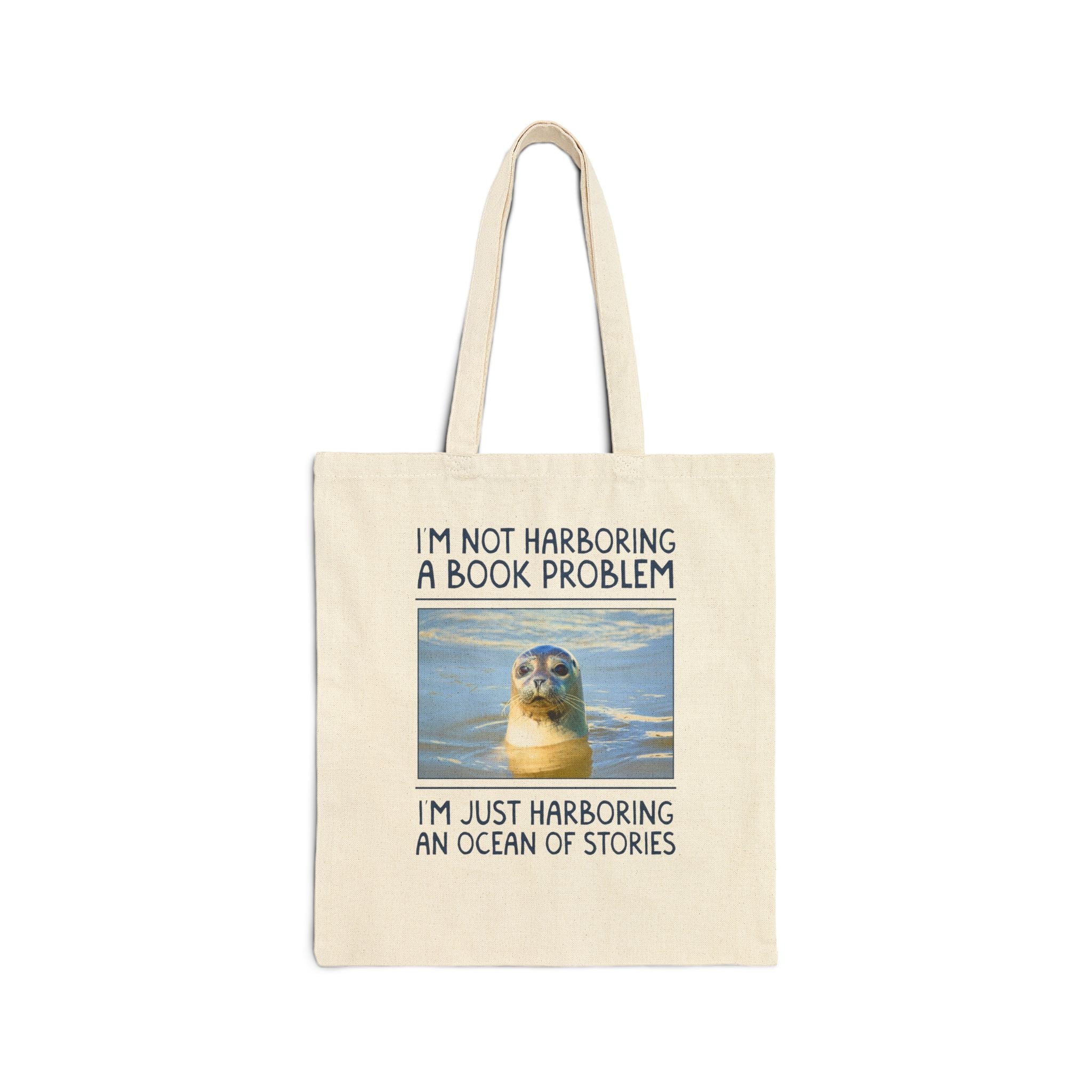 I'm Not Harboring a Book Problem, I'm Harboring and Ocean of Stories: Funny Bookish Tote Bag with Cute Dreamcore Seal in Water, Silly Book Lover Gift - Opal and June