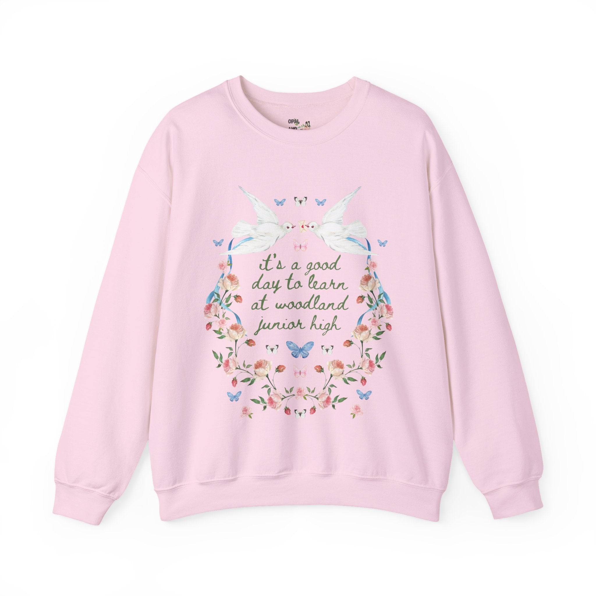 Woodland Junior High School Sweatshirt: Doves It's a Good Day to Learn | FPS + Opal and June Sweatshirt, Fayetteville Public Schools - Opal and June
