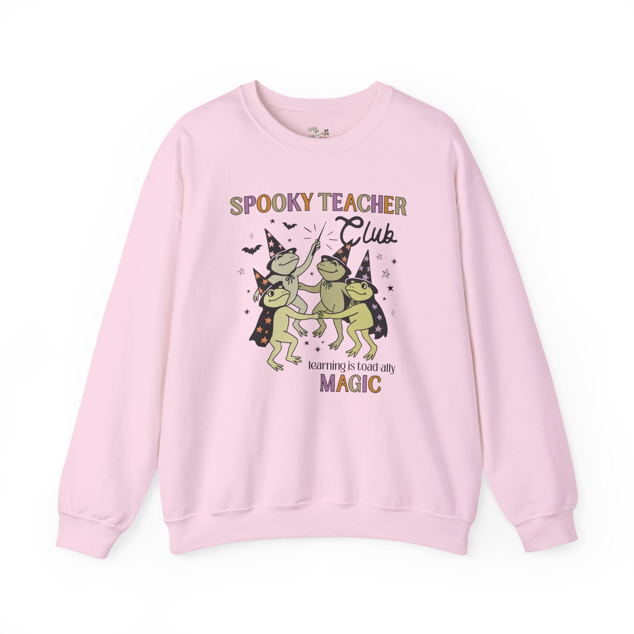 Halloween Teacher Sweatshirt with Cute Witchy Frogs: Learning is Magic! Funny Saying Spooky Season Crewneck with Stars, Magical Animal Lover - Opal and June