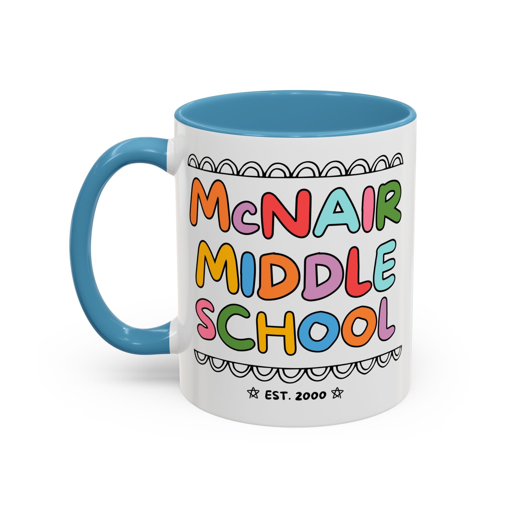 McNair Middle School 11 Oz Coffee Mug: Rainbow Letters | FPS + Opal and June Coffee Mug, Fayetteville Public Schools - Opal and June
