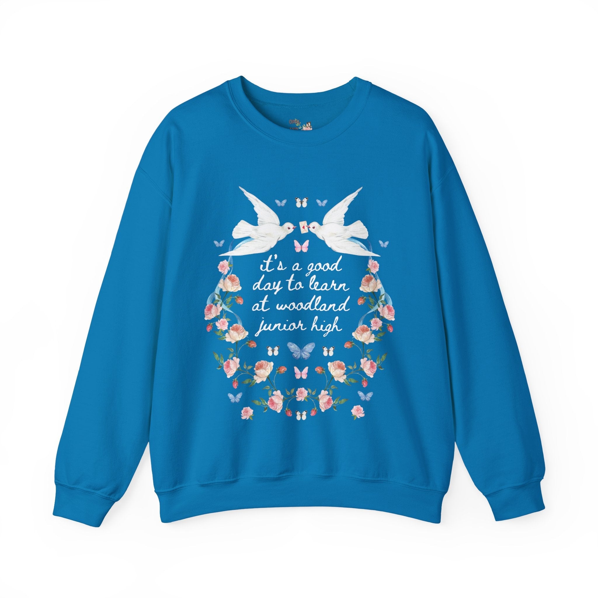 Woodland Junior High School Sweatshirt: Doves It's a Good Day to Learn | FPS + Opal and June Sweatshirt, Fayetteville Public Schools - Opal and June