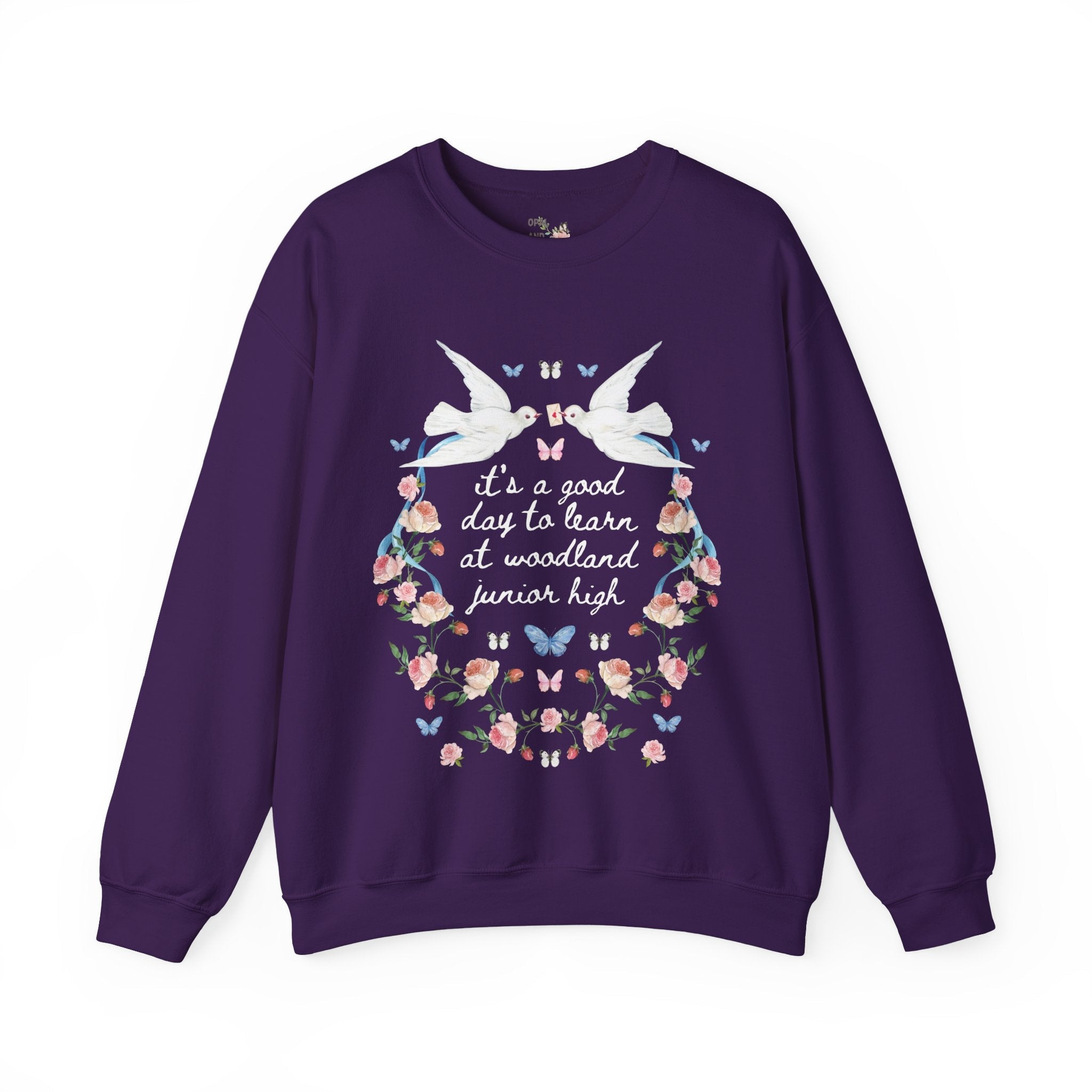 Woodland Junior High School Sweatshirt: Doves It's a Good Day to Learn | FPS + Opal and June Sweatshirt, Fayetteville Public Schools - Opal and June