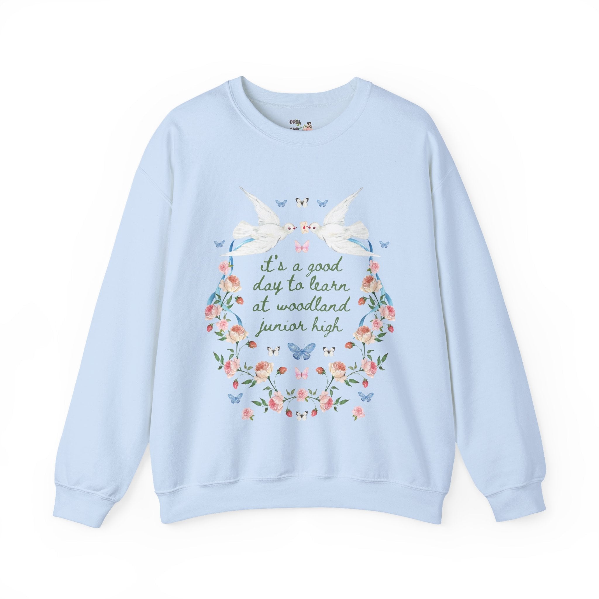 Woodland Junior High School Sweatshirt: Doves It's a Good Day to Learn | FPS + Opal and June Sweatshirt, Fayetteville Public Schools - Opal and June